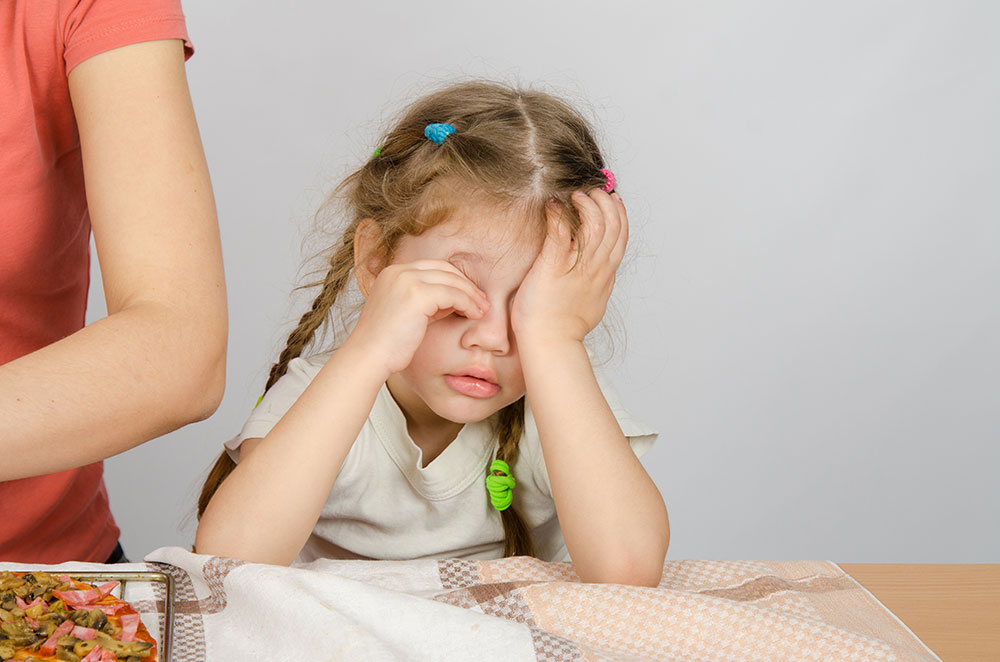 Children with sleep apnea have trouble sleeping and can be irritable and drowsy during the day.
